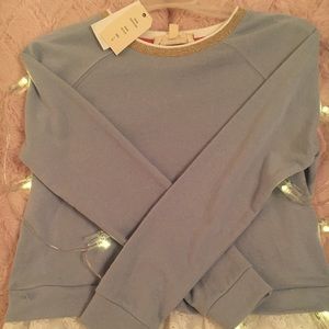 Blue long sleeve shirt with lace like bottom :)